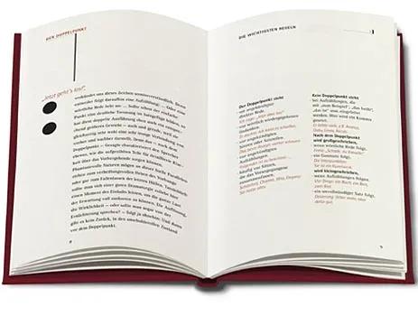 Doppelseite 8 mit großem Doppelpunkt und Text